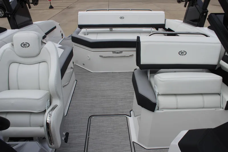Slide: The Image of 2024 Cobalt R6 boat interior with luxurious white seating and modern design. - 28