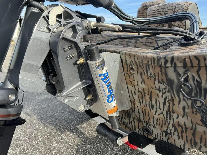 Slide: The Image of 2025 Xpress H18 Bass boat with Atlas hydraulic jack plate. - 12