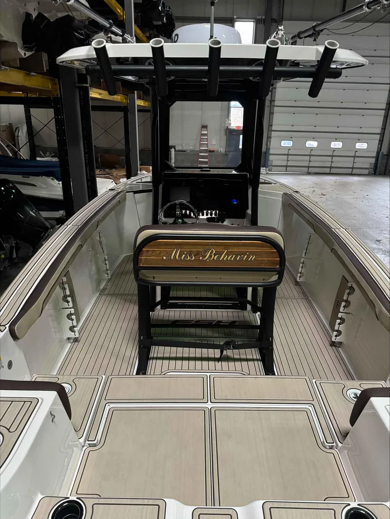 Slide: The Image of 2023 Yamaha Boats 255FSH SPORT E interior, featuring sleek design and modern controls. - 7