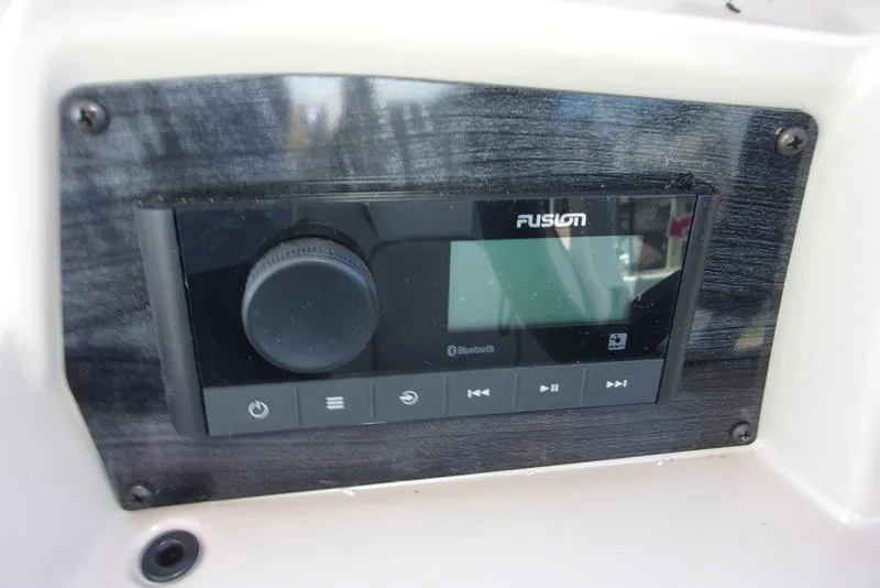 Slide: The Image of Fusion audio system on 2023 Tahoe Sport Bow 17 FT boat dashboard. - 12