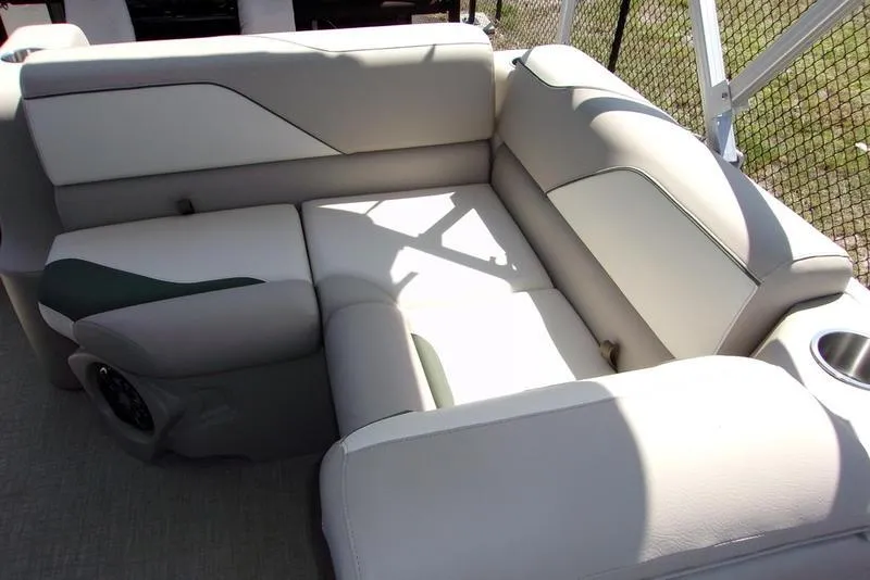 Slide: The Image of 2023 Tahoe Sport Bow 17 FT boat interior with plush seating and cup holder. - 9