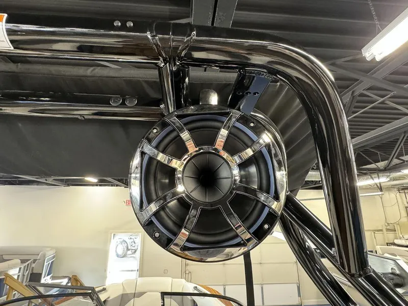 Slide: The Image of 2025 Moomba Mojo boat speaker system in a showroom setting. - 11