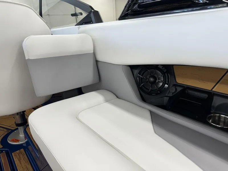 Slide: The Image of 2025 Moomba Mojo boat interior with white seating and speaker system. - 20