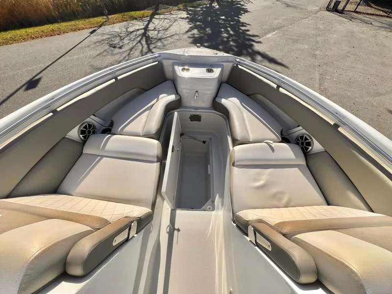 Slide: The Image of 2025 Crownline 280 DC boat interior with spacious seating and modern design. - 18