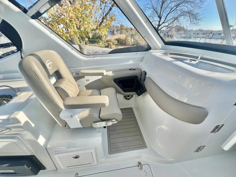 Slide: The Image of 2025 Crownline 280 DC boat interior with sleek seating and modern design. - 31