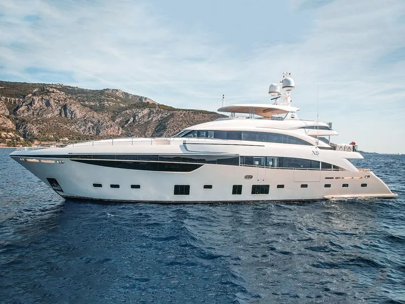 Slide: The Image of A serene mountain landscape at sunrise, with soft golden light casting over snow-capped peaks, a calm reflective lake in the foreground, and lush green trees surrounding the scene. The sky is a blend of orange, pink, and blue hues, adding warmth and tranq - 4