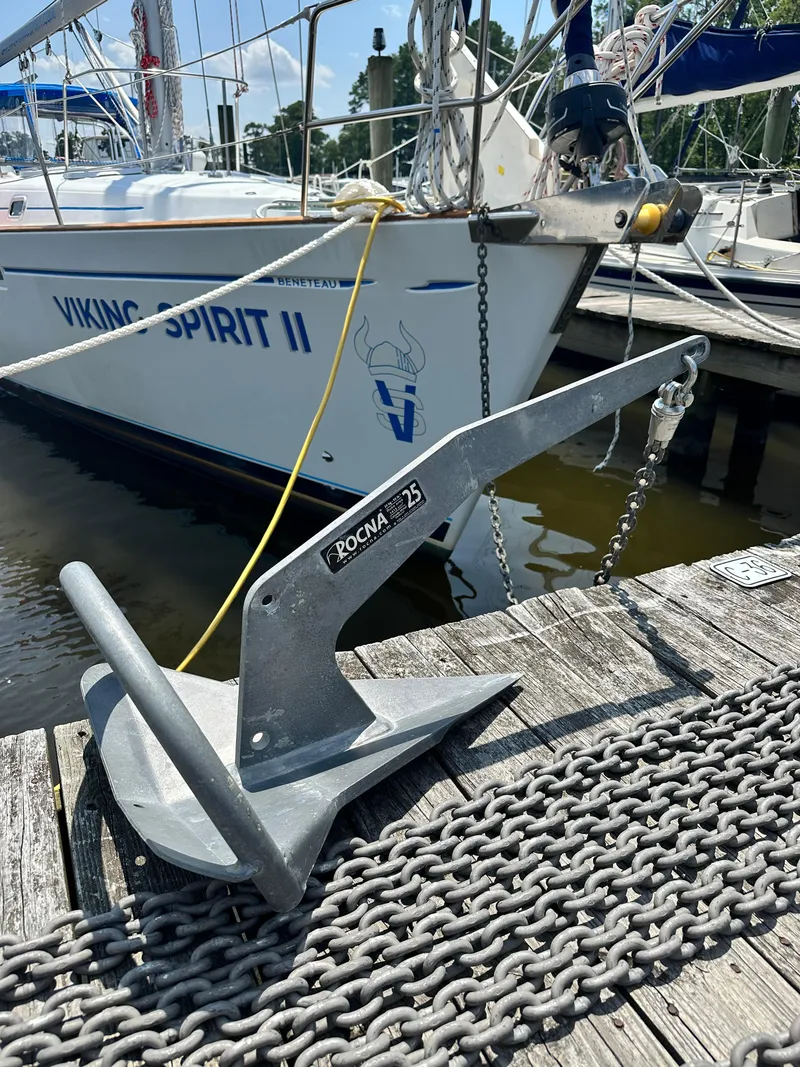 Slide: The Image of Beneteau Oceanis Clipper 461, 1999 model, with Highfield dinghy and Mercury outboard motor. - 36