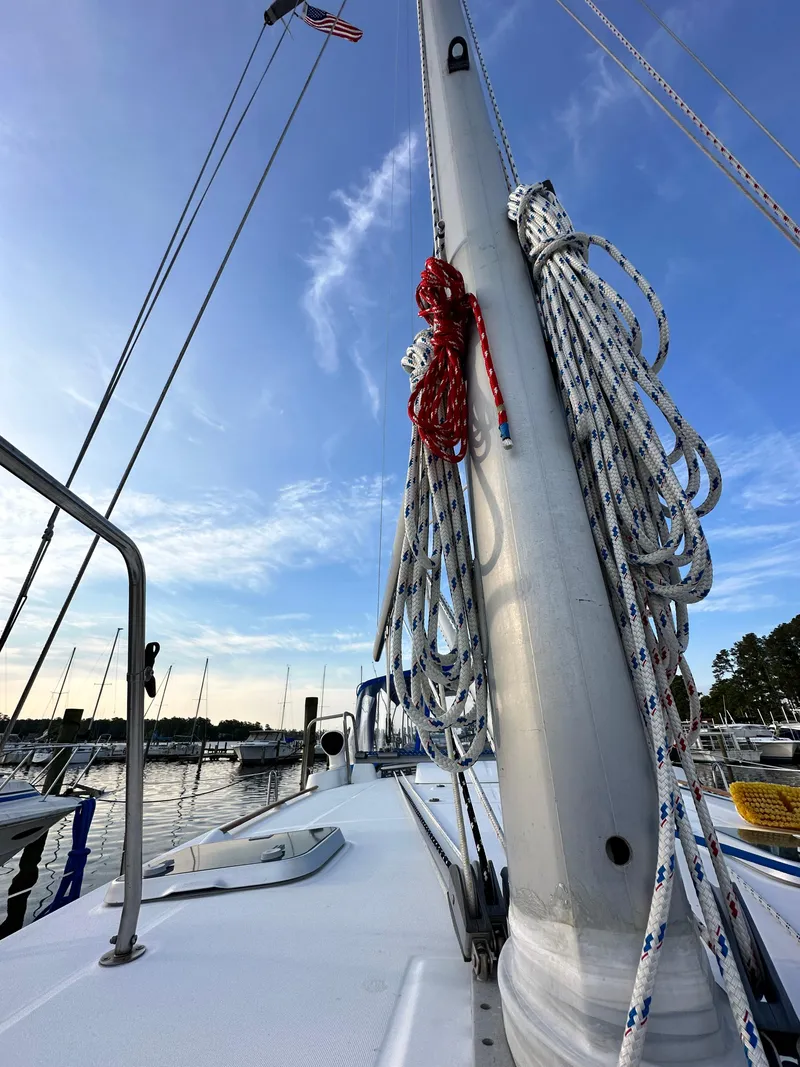 Slide: The Image of Tower in a box davit system with solar panels, Starlink mounted unit and Highfield dinghy - 45