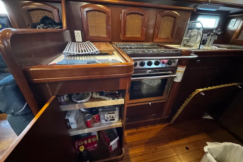 Slide: The Image of ample galley storage space, showing an entire built in cabinet. - 75