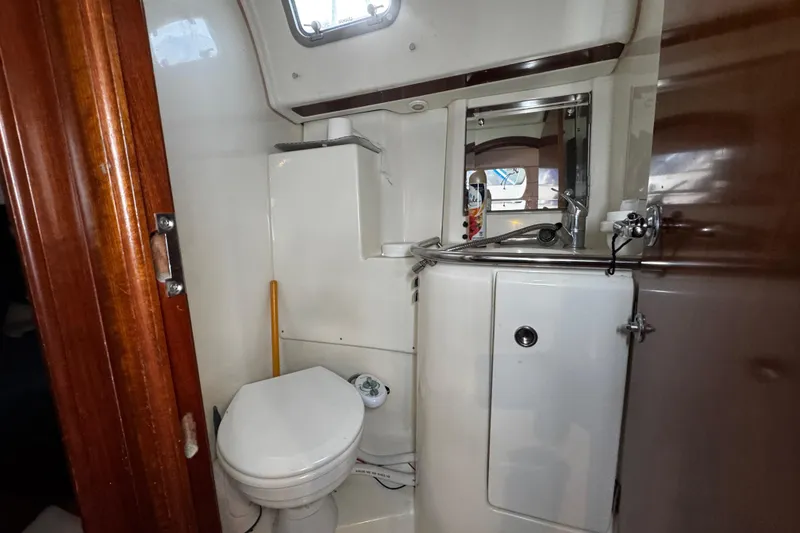 Slide: The Image of wet head off of main salon / aft berth - 77