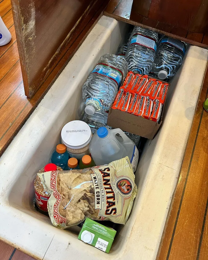 Slide: The Image of ample storage spaces to do long term provisioning. This is under the floorboards of the salon area - 97