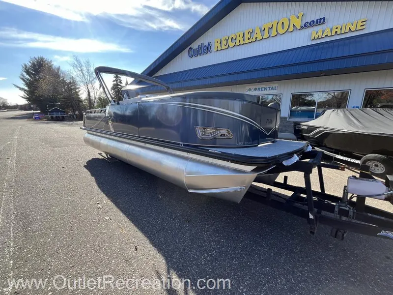 Slide: The Image of 2024 Avalon LSZ Versatile Rear Bench pontoon boat at Outlet Recreation. - 10