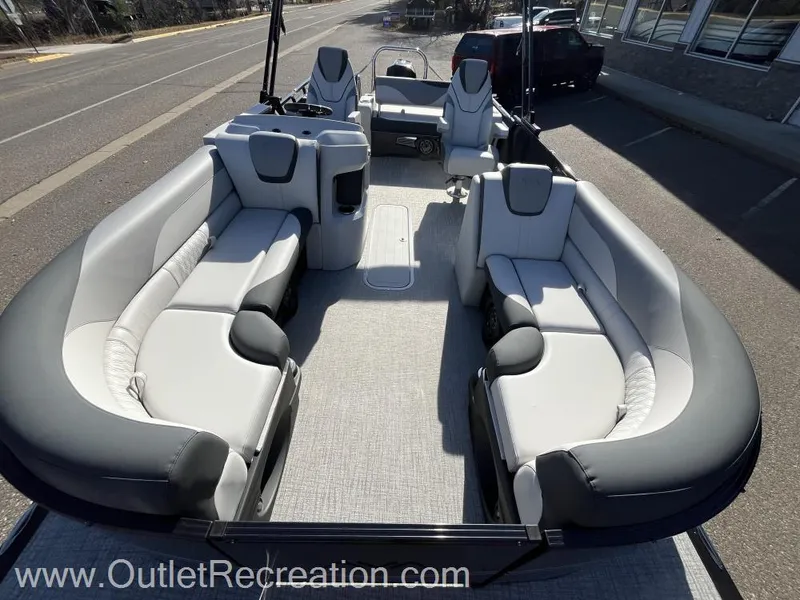 Slide: The Image of 2024 Avalon LSZ Versatile Rear Bench pontoon boat with spacious seating and modern design. - 11