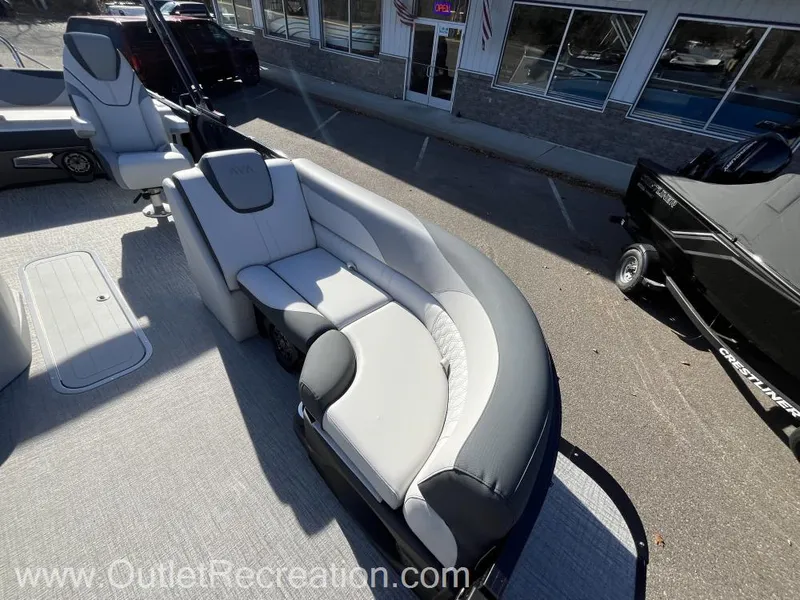 Slide: The Image of 2024 Avalon LSZ Versatile Rear Bench boat with sleek seating design. - 13