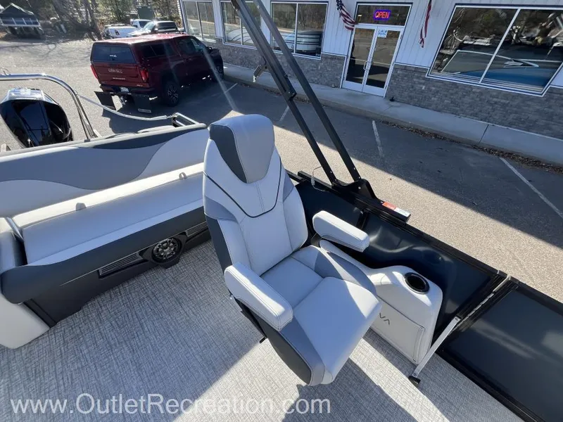 Slide: The Image of 2024 Avalon LSZ Versatile Rear Bench boat with modern seating and sleek design. - 16