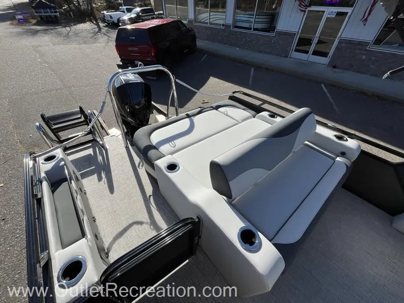 Slide: The Image of 2024 Avalon LSZ Versatile Rear Bench boat with spacious seating and modern design. - 18