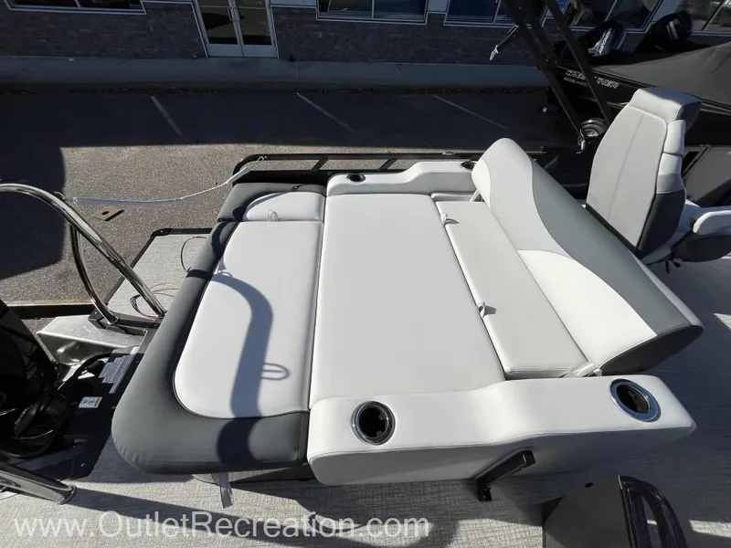 Slide: The Image of 2024 Avalon LSZ Versatile Rear Bench with cup holders on a boat deck. - 20
