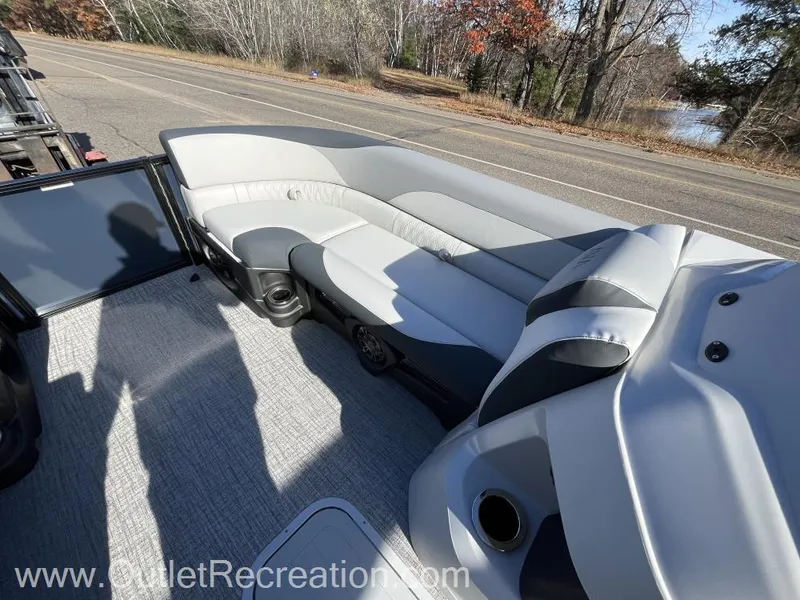 Slide: The Image of 2024 Avalon LSZ Versatile Rear Bench boat interior with gray seating. - 24