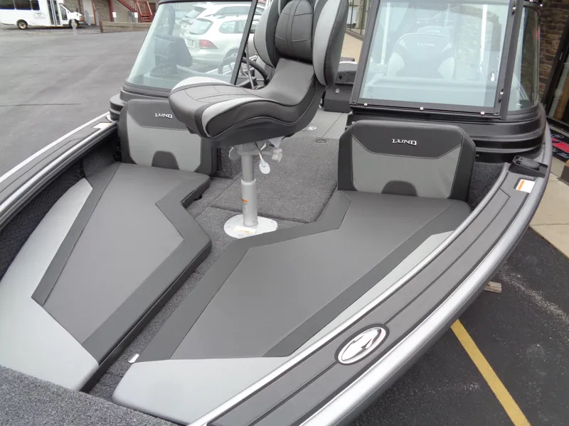 Slide: The Image of 2025 Lund 1975 Pro-V boat interior with sleek seating and modern design. - 12