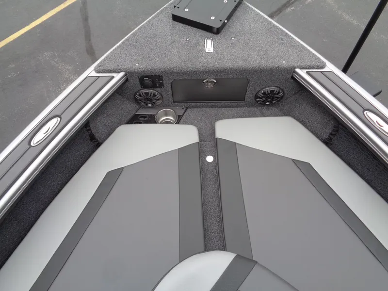 Slide: The Image of 2025 Lund 1975 Pro-V boat interior with sleek seating and modern design. - 14