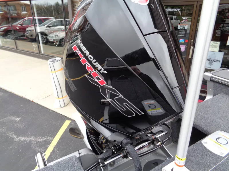 Slide: The Image of Mercury Pro XS engine on 2025 Lund 1975 Pro-V boat, outdoor display. - 38