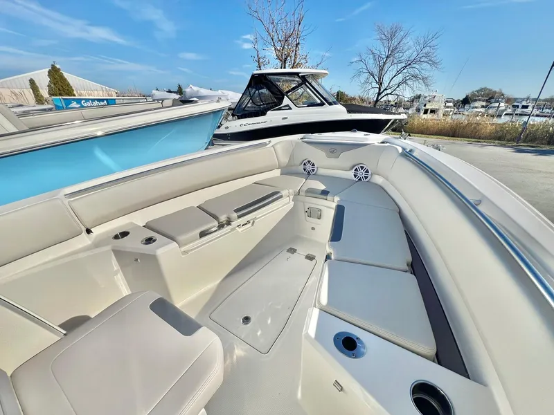 Slide: The Image of 2025 Sailfish 232 CC boat interior with spacious seating and modern design. - 17