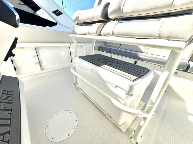 Slide: The Image of 2025 Sailfish 232 CC boat interior with seating and storage. - 9