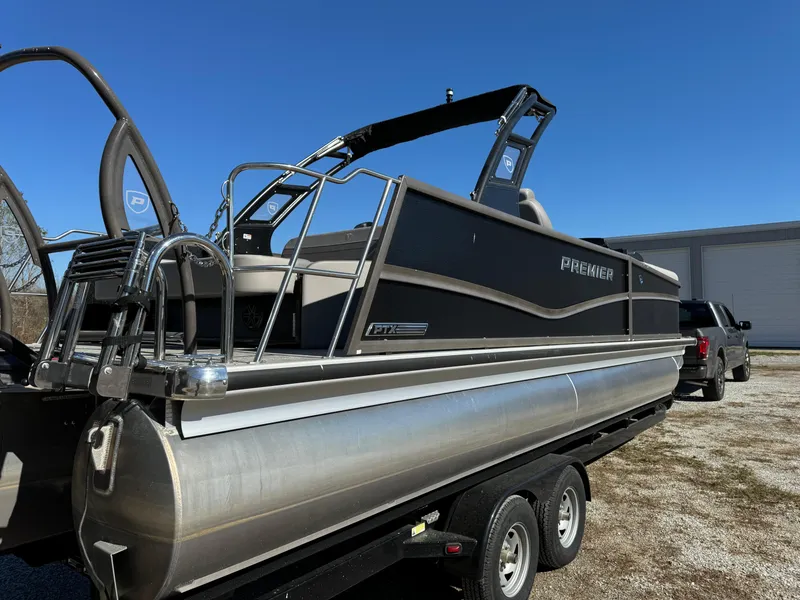 Slide: The Image of 2024 Premier 250 Sunsation pontoon boat on trailer, side view. - 10