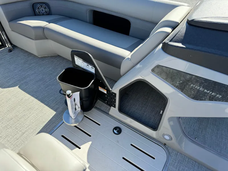 Slide: The Image of 2024 Premier 250 Sunsation boat interior with seating and storage features. - 19
