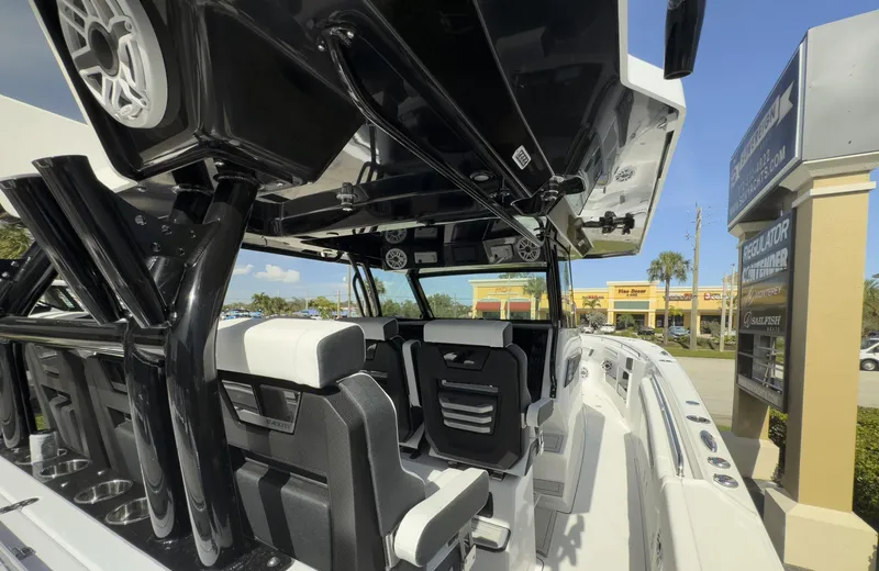 Slide: The Image of 2024 Blackfin 400 CC boat interior with sleek seating and modern design features. - 24