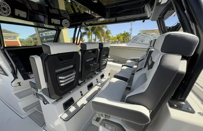 Slide: The Image of 2024 Blackfin 400 CC interior with modern seating and sleek design. - 38