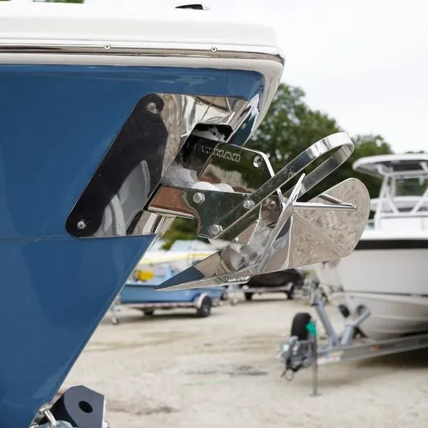 Slide: The Image of 2025 Cobia 220 Center Console boat with stainless steel anchor detail. - 12