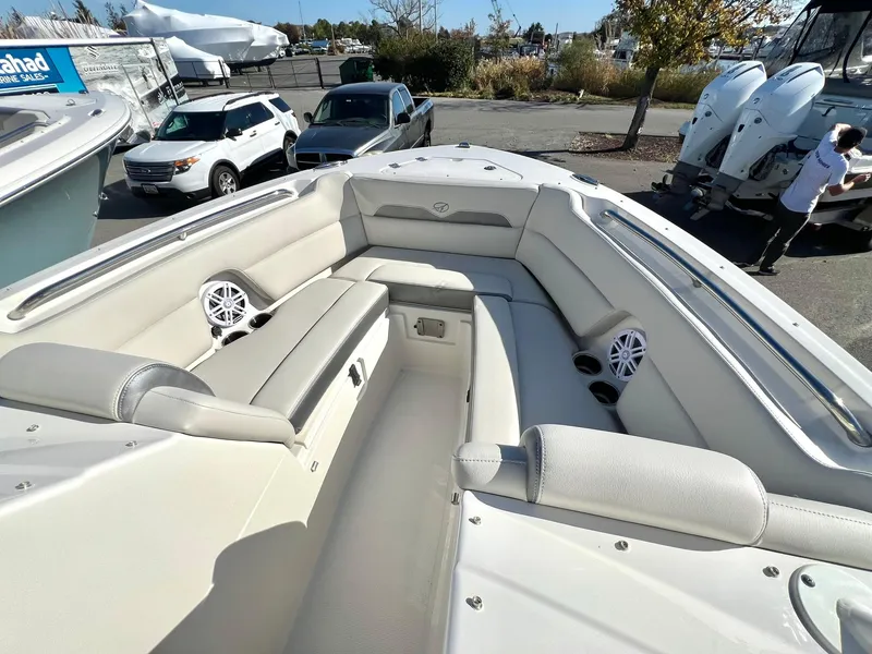 Slide: The Image of 2025 Sailfish 245 DC boat interior with spacious seating and modern design. - 25