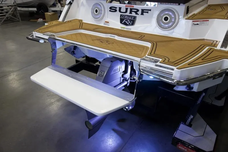 Slide: The Image of 2025 Cobalt R8 Surf boat with extended swim platform and stylish deck design. - 6