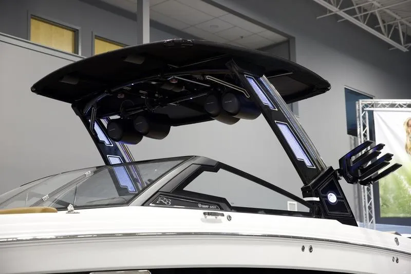 Slide: The Image of 2025 Cobalt R8 Surf boat with advanced wakeboard tower and speakers. - 7