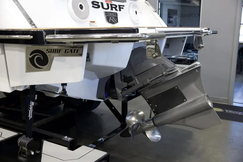 Slide: The Image of 2025 Cobalt R8 Surf boat with Surf Gate technology, showcasing advanced propulsion system. - 5