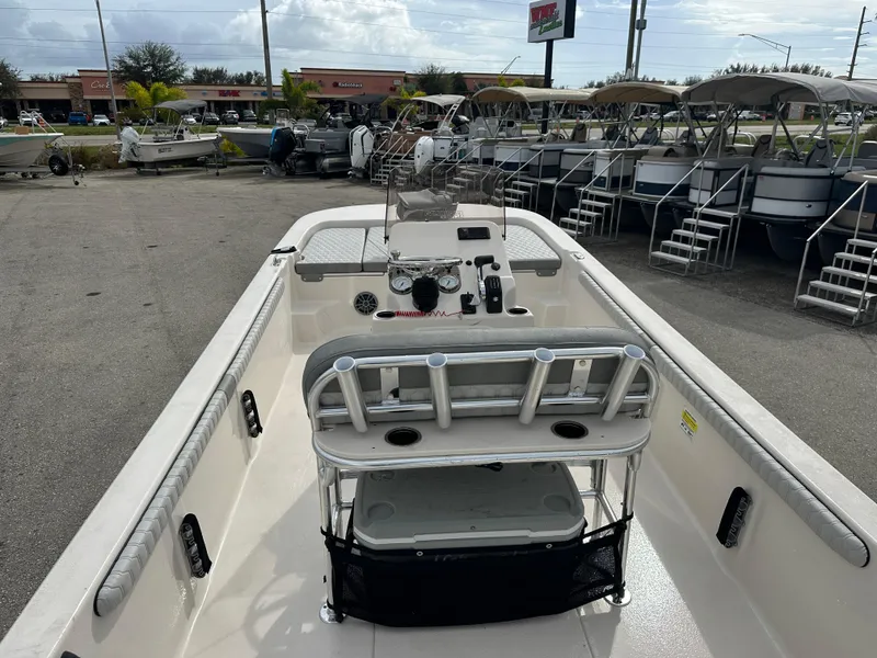 Slide: The Image of 2025 Carolina Skiff 21 LS boat interior at a dealership. - 7
