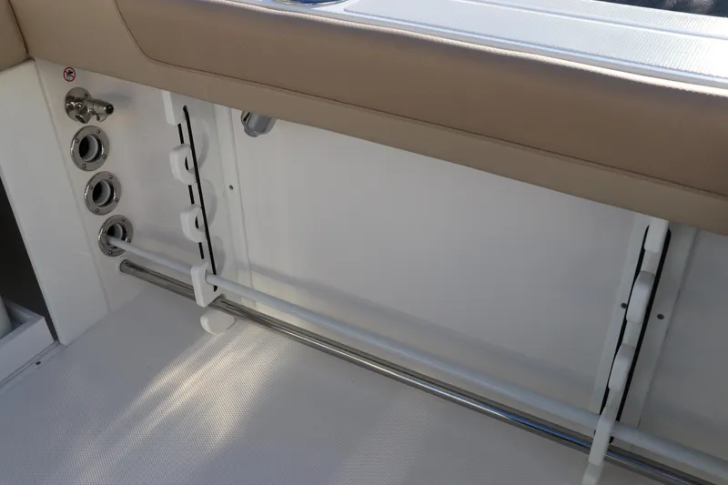 Slide: The Image of 2025 Edgewater 248 CX boat seat, beige leather, ergonomic design. - 12