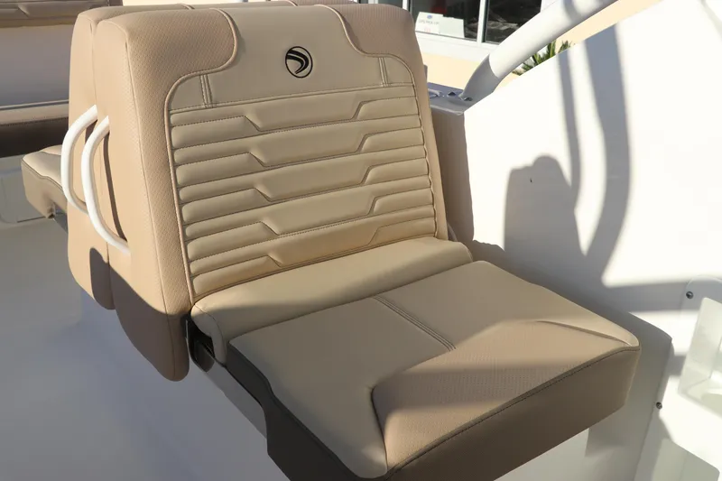Slide: The Image of Edgewater 248 CX 2025 boat interior with faucet and logo detail. - 18