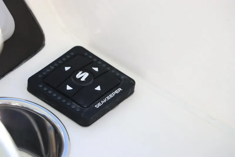 Slide: The Image of Edgewater 248 CX 2025 dashboard with Yamaha controls and buttons. - 24