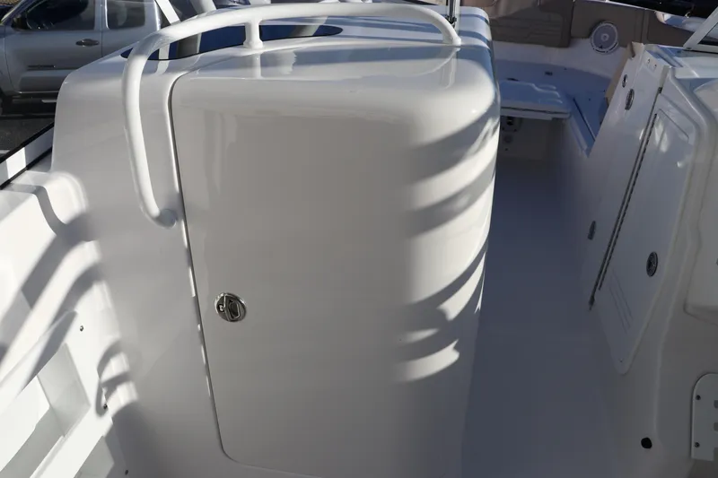 Slide: The Image of Edgewater 248 CX 2025 dashboard with Yamaha and Garmin navigation systems. - 29