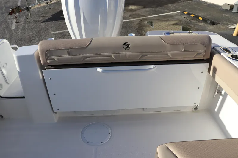 Slide: The Image of Edgewater 248 CX 2025 boat livewell with open lid, showcasing interior details. - 9