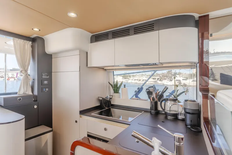 Slide: The Image of Modern kitchen interior of 2022 Azimut 55 Fly yacht with sleek design. - 15