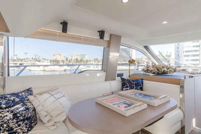 Slide: The Image of Luxurious interior of 2022 Azimut 55 Fly yacht with elegant seating and decor. - 16