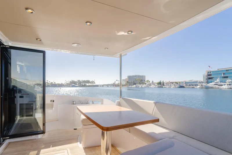 Slide: The Image of Luxurious 2022 Azimut 55 Fly yacht interior with waterfront view. - 18