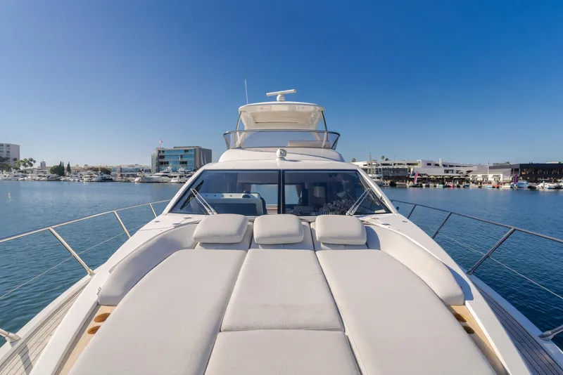 Slide: The Image of Azimut 55 Fly 2022 yacht on calm water with clear blue sky. - 23