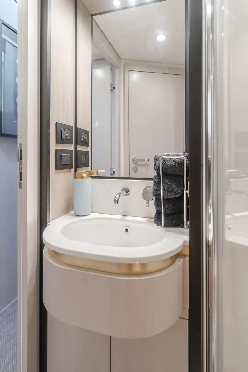 Slide: The Image of Luxurious bathroom in 2022 Azimut 55 Fly yacht with modern fixtures and elegant design. - 33
