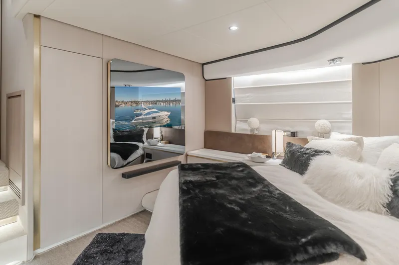 Slide: The Image of Luxurious interior of 2022 Azimut 55 Fly yacht bedroom with modern decor. - 38