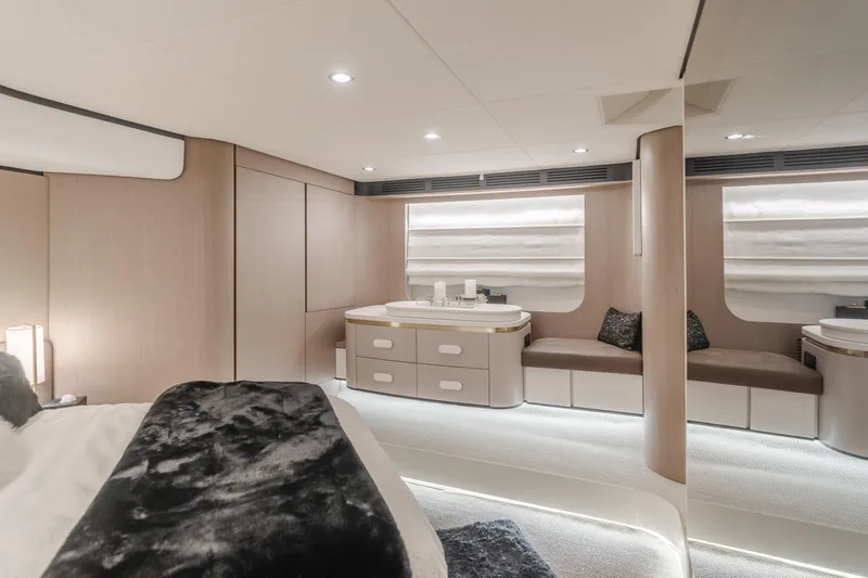 Slide: The Image of Luxurious interior of 2022 Azimut 55 Fly yacht with modern furnishings and ambient lighting. - 39