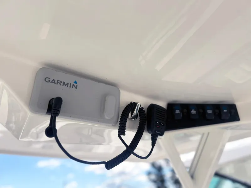 Slide: The Image of Garmin marine electronics on 2025 Sailfish 276 DC boat dashboard. - 23